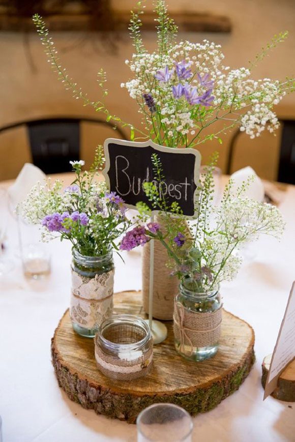 Centros de mesa con tarros de cristal para bodas