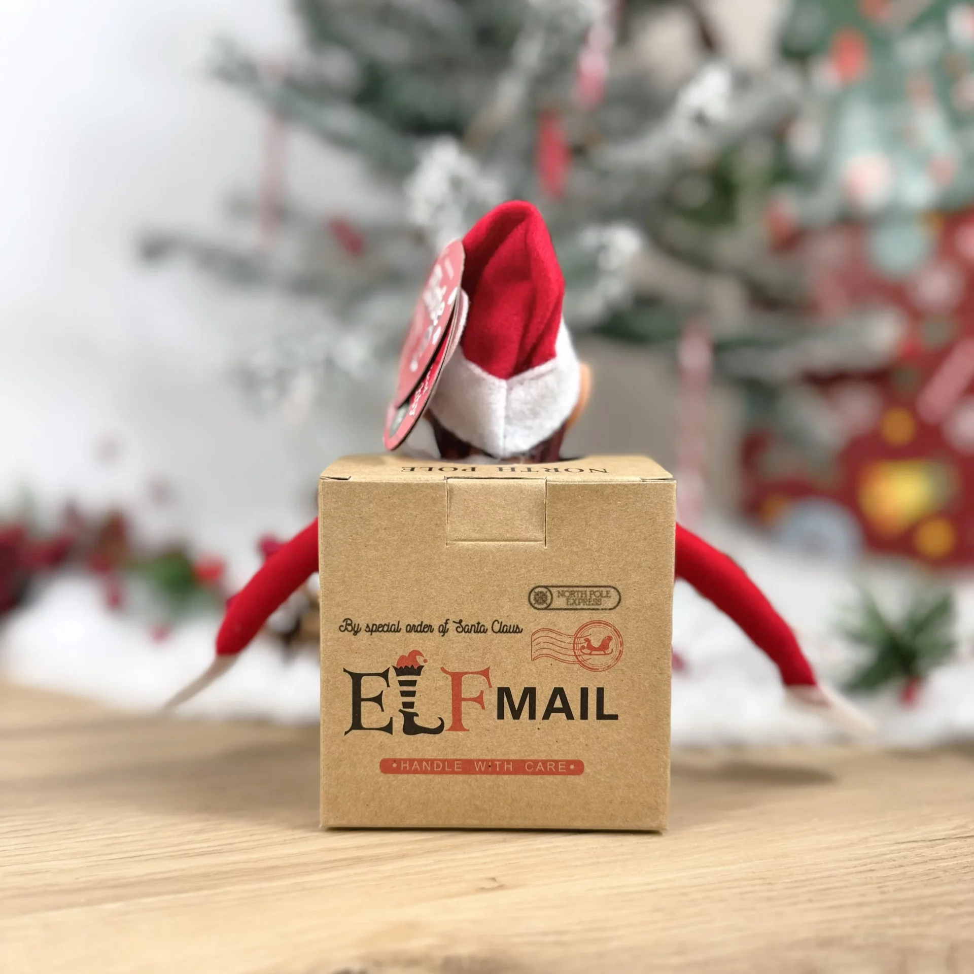Elfo travieso de Navidad con Caja Sorpresa DETRAS